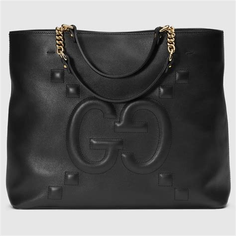 Gucci embossed leather tote bag